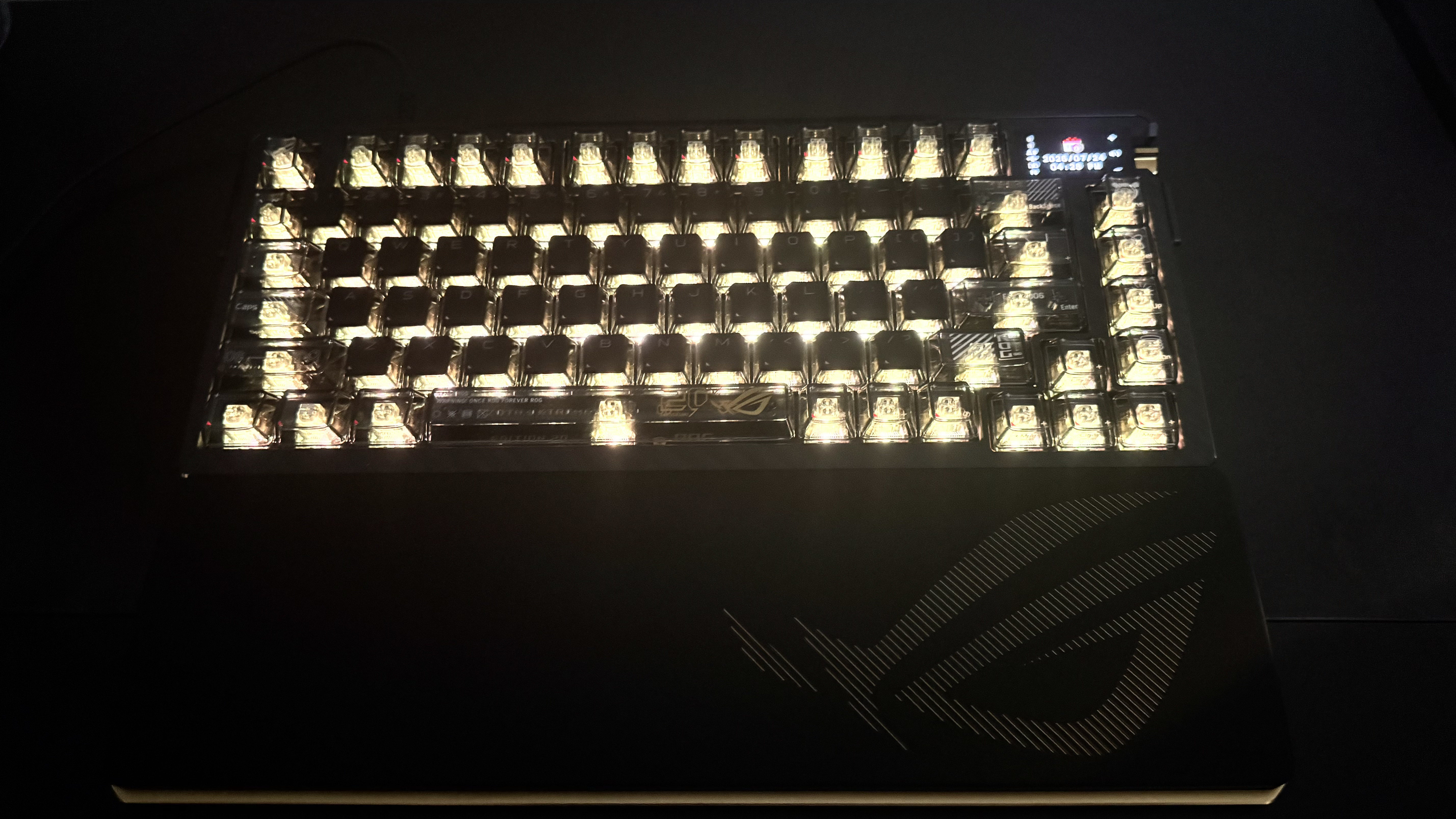 Asus ROG Azoth Extreme Edition 20 with rgb on, in the dark
